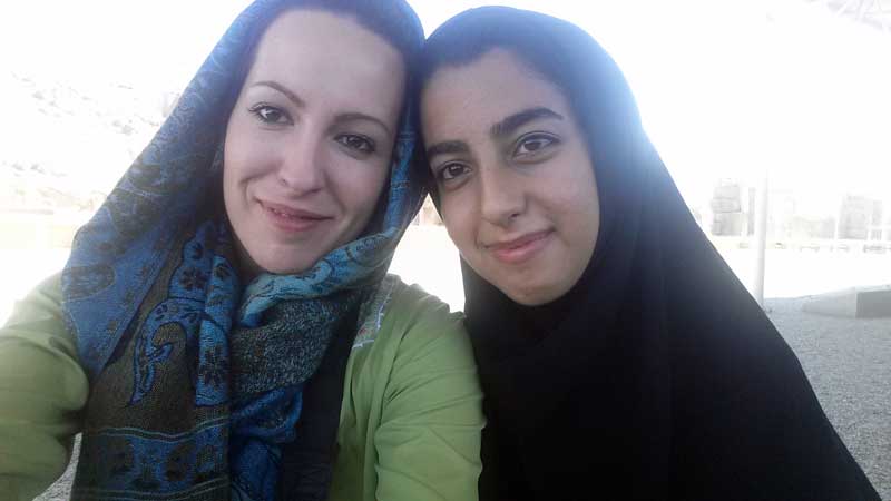 MIR staffer Marina Karpstova poses for a selfie with a friend in Iran. Photo crdit: Marina Karpstova