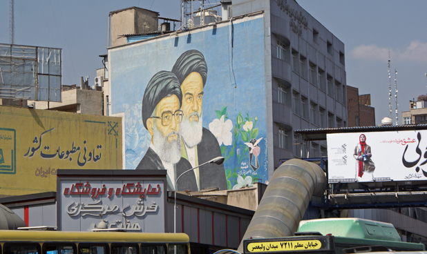 Murals preserve Iran’s past and present, here depicting the current and 1979 Revolution ayatollahs. Photo credit: Joanna Millick