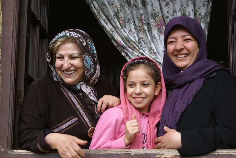 Three versions of hijab in Iran. Photo credit: Joanna Millick