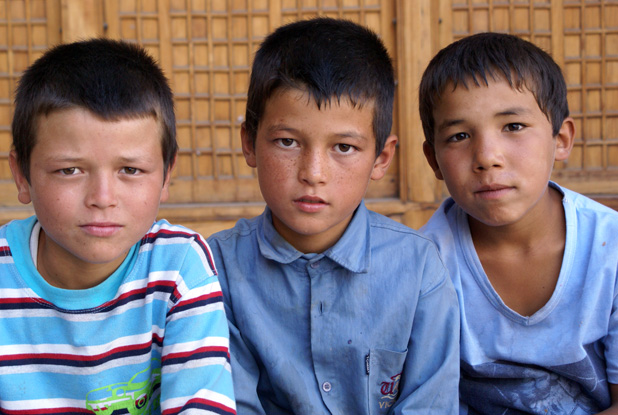 A bit shy for the camera, these boys cheerfully shared Iranian hospitality with Joanna Millick ‘s MIR group. Photo credit: Joanna Millick