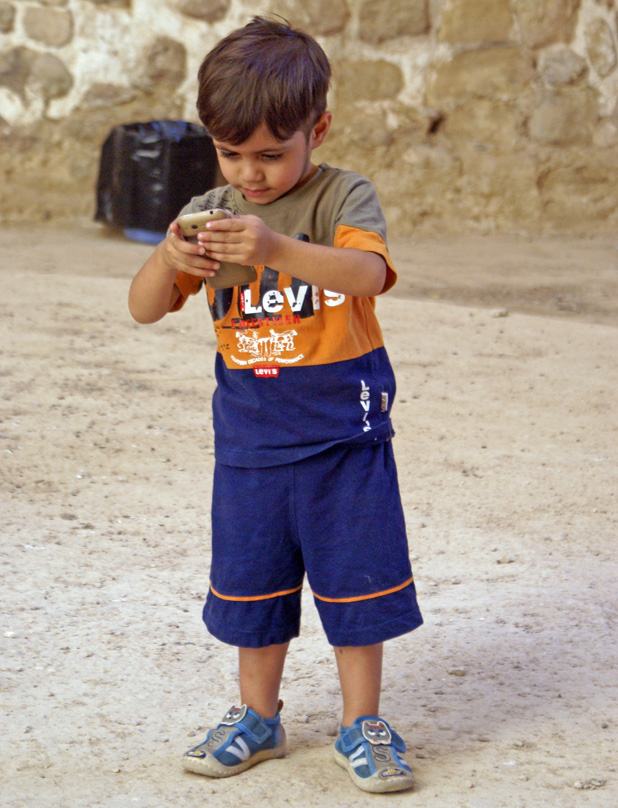 Even at this young age, many Iranians are virtually connected to the world. Photo credit: Joanna Millick
