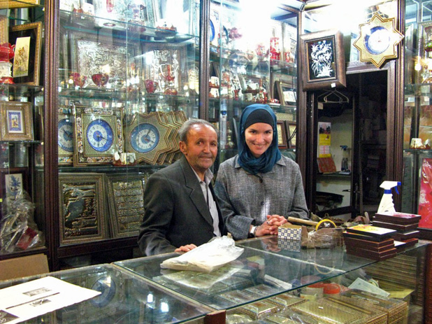 One of many cherished memories for Devin Connolly: spending time with this shopkeeper in Iran. Photo credit: Devin Connolly