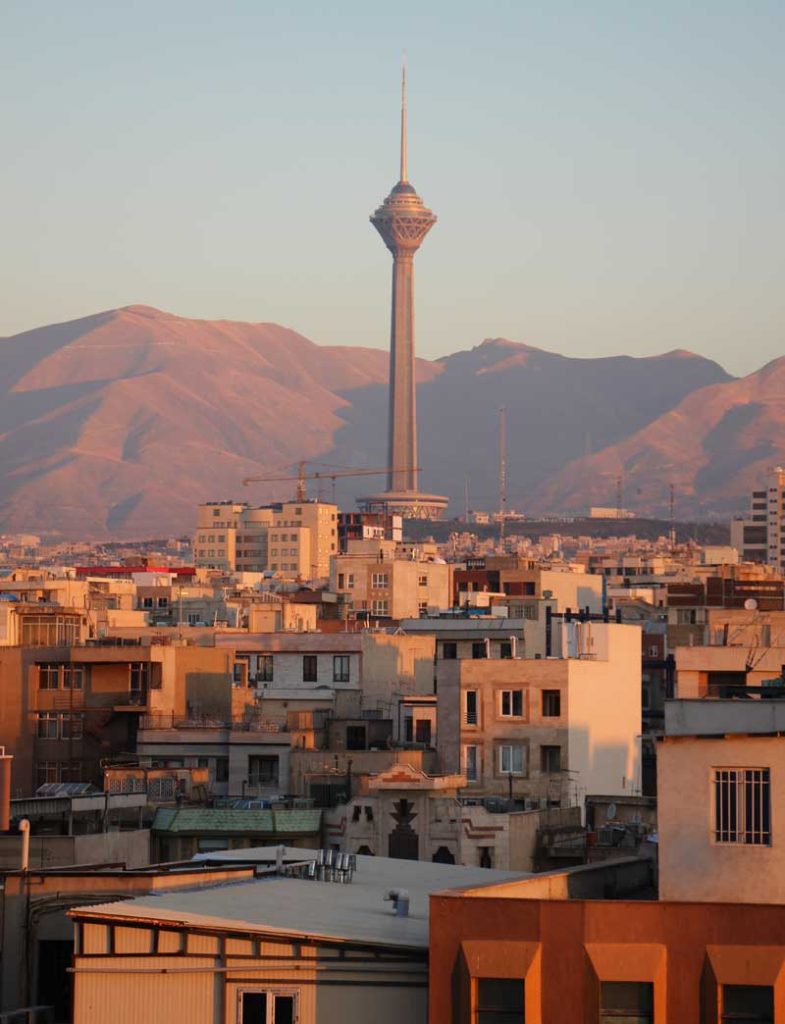 The Alborz Mountains tower over Tehran at sunset. Photo credit: Jake Smith