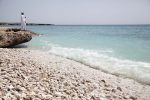 An Omani man on the beach near Sur.