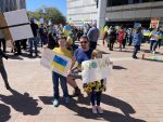 MIR's Jake Smith and his children at the rally in Tucson. Credit: Jake Smith