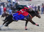 Racing across the grounds at the World Nomad Games.