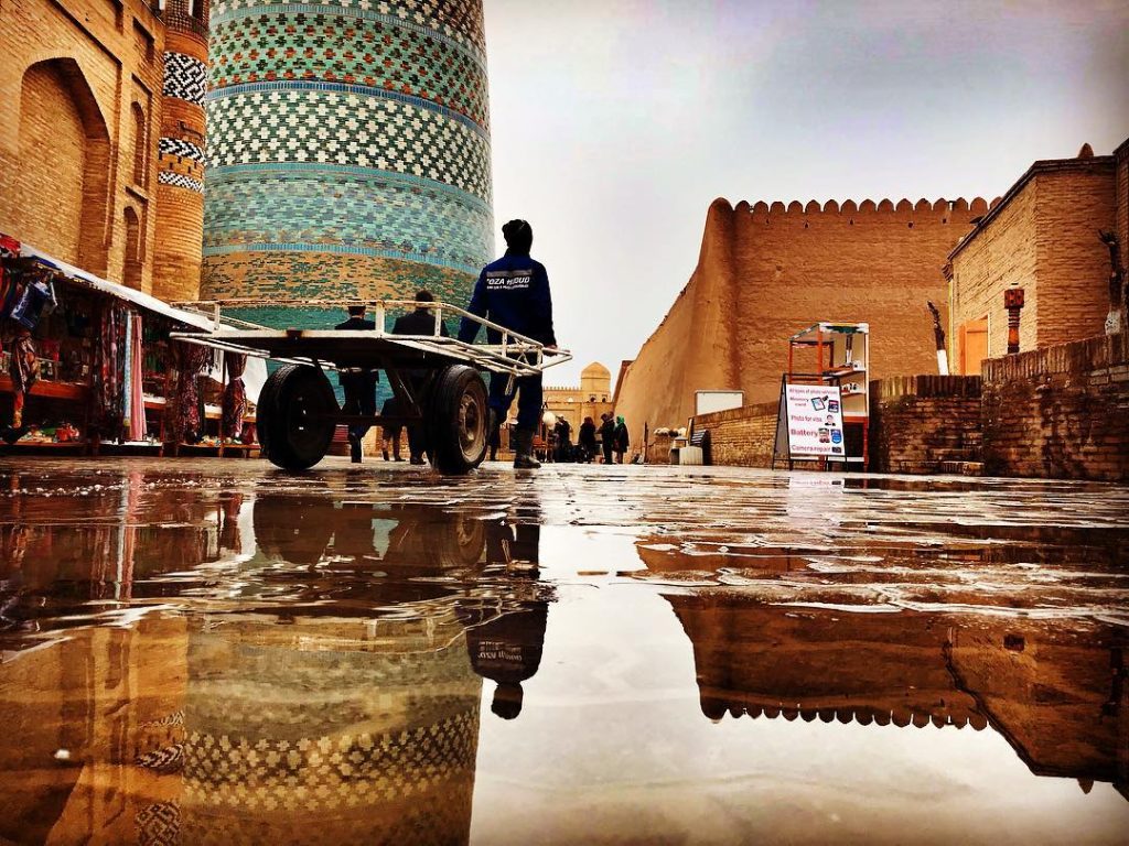 A scene in Khiva reflected in recent rainfall. Photo credit: Abdu Samadov