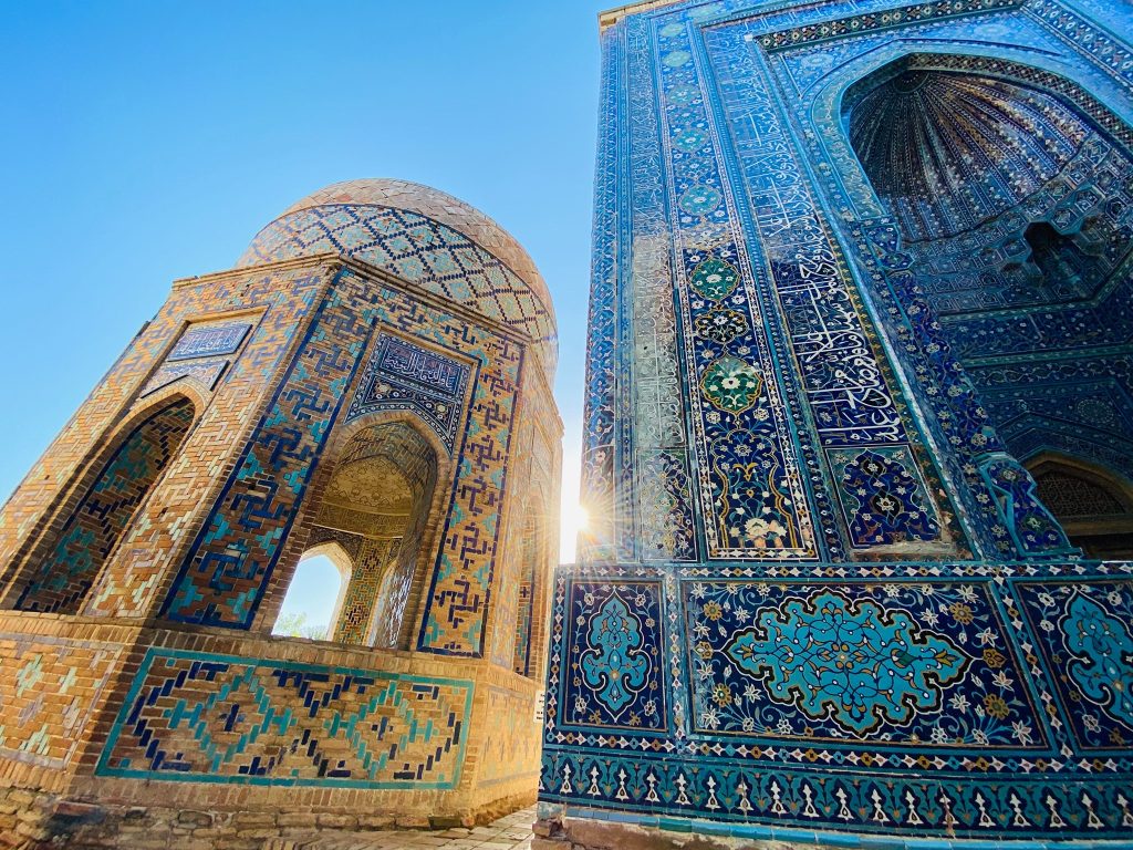 Golden light and blue Timurid tiles in Uzbekistan. Photo credit: Abdu Samadov