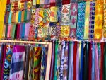 Colorful silks on display in Uzbekistan. Photo credit: MIchel Behar