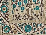 An intricately embroidered suzani on display in an Uzbek market. Photo credit: Michel Behar