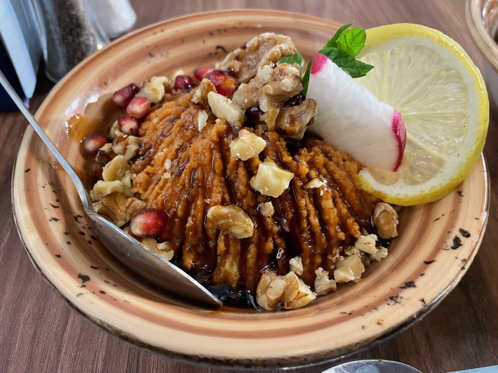 Muhammara - a paste of ground nuts, roasted peppers, and pomegranate molasses.