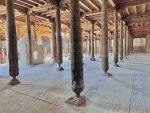 A forest of wooden columns inside Khiva's Juma Mosque. Photo credit: Michel Behar